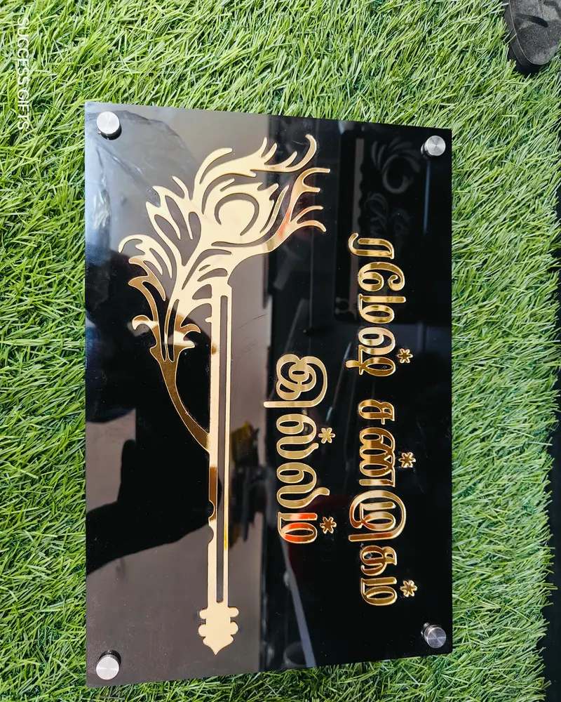 Vertical acrylic name board with gold lettering